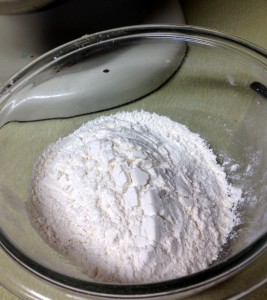 Measure one cup of bread flour into a small bowl to sift spices into.