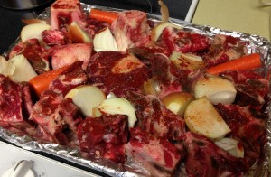 I line a sturdy half sheet pans with sheets of aluminum foil to aid in clean-up. Roast for an hour in a 350 degree oven.