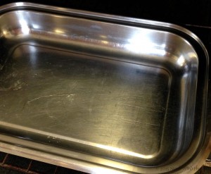 Empty roasting pan that will the water bath.