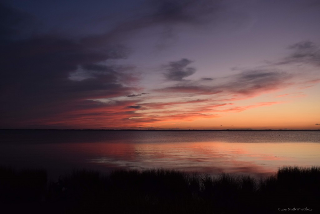 The sound still quiet, continued to reflect the sky.