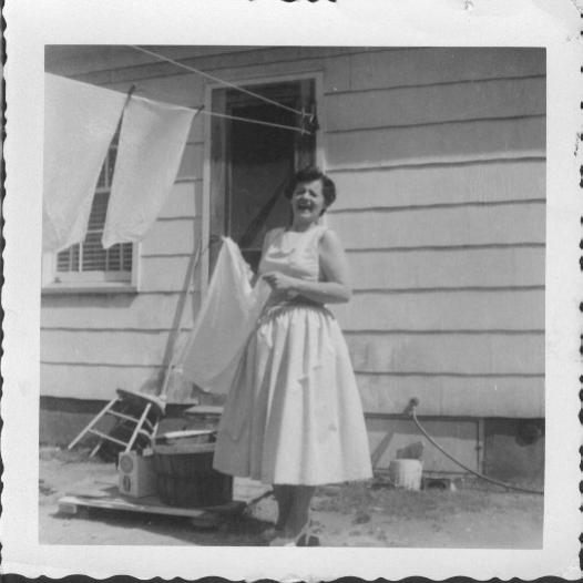 My favorite picture of my mother. Handing laundry in three inch heels. What a warrior. 